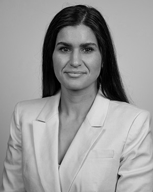 Headshot of Danielle Jaul wearing a suit